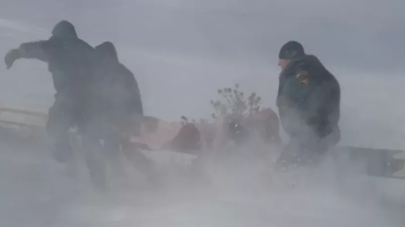 Rescue Team Aids Pregnant Woman Stuck in Vehicle