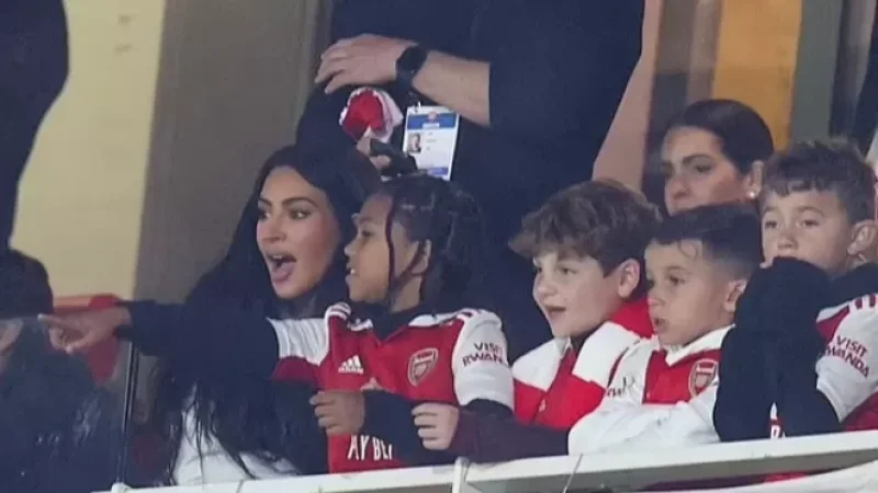 Photos: Kim Kardashian Attends Arsenal-Sporting Match with Son