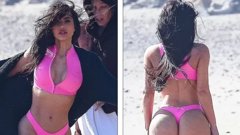 Photos: Kim Kardashian Caught in Pink Swimsuit by Paparazzi