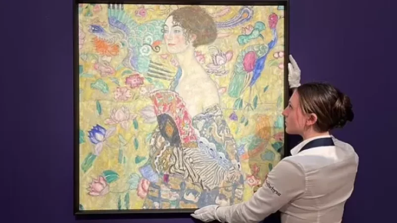 PHOTOS: 'Woman with Fan' Becomes Most Expensive Artwork Ever Sold at Auction in Europe
