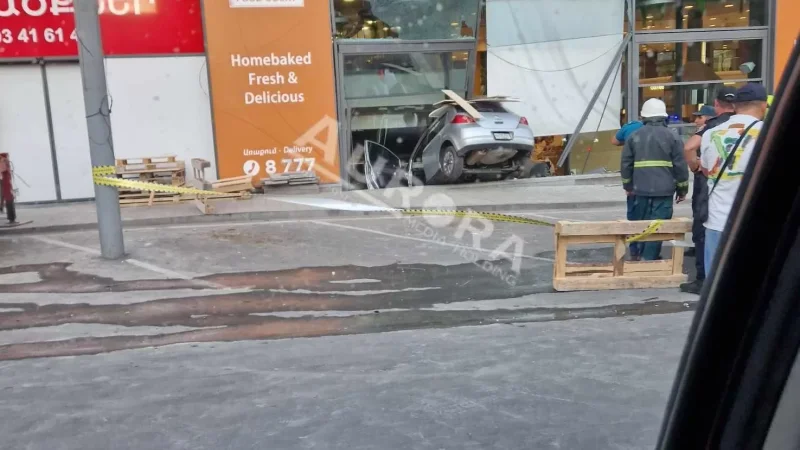 Photos: Car Crashes into SAS Food Court Glass Facade
