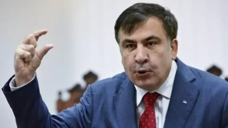 Photo: Saakashvili Breaks Pensioner's Hand