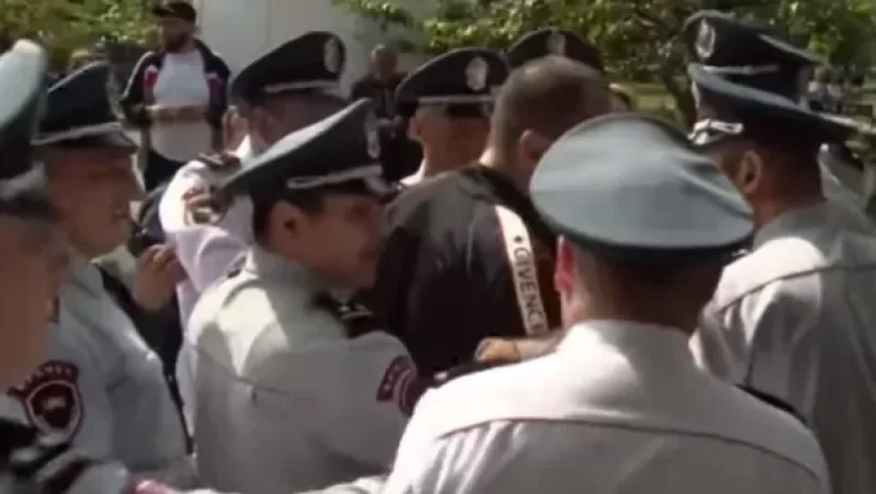 VIDEO: Dispute in Court Yard; There is a Detained Individual
