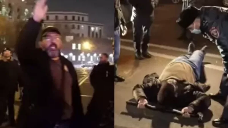 Relative of Soldiers Lies on Asphalt Refusing to Get Up