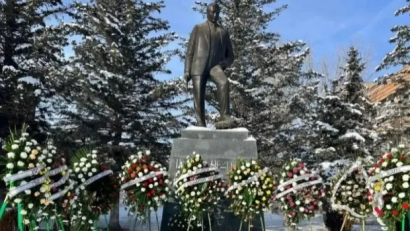 Numerous Flowers and Wreaths at the Statue of Solomon Teylerian: Action in Maralik