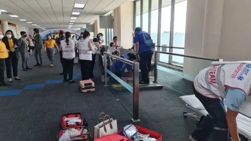 PHOTOS: Moving walkway drags woman's leg at Bangkok international airport, resulting in amputation