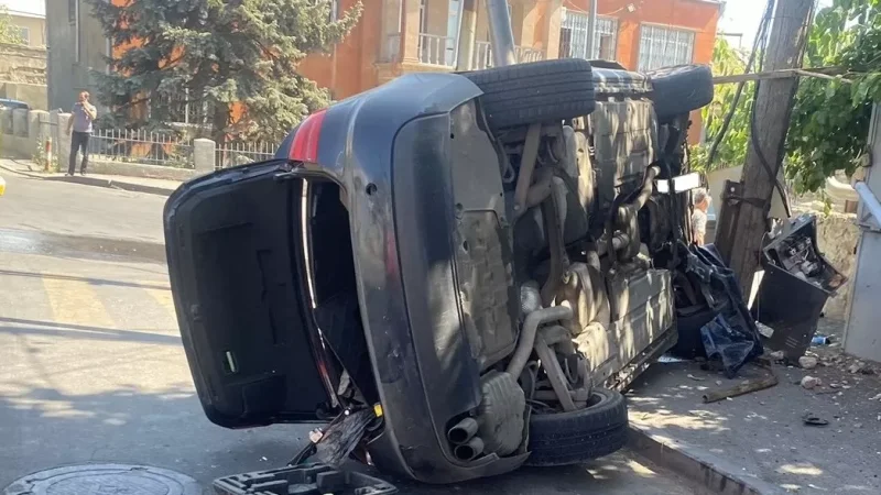 PHOTOS: Car veers off road and collides with several poles