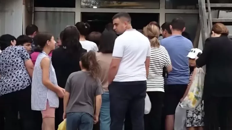 Photo: Elderly Man Faints in Line for Bread in Artsakh