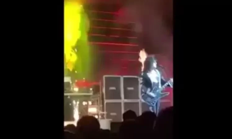 VIDEO: Fireworks Ignite Hair of Kiss Frontman Impersonator During Performance