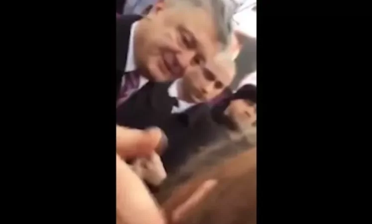 VIDEO: Petro Poroshenko Hits Girl in the Face During Conversation
