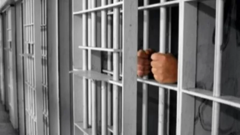 Inmates Throw Homemade Objects Containing Flammable Materials from Prison Bars, Fire Erupts