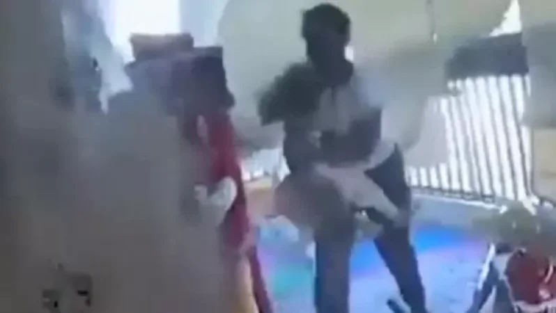 VIDEO: How a Woman 'Saves' a Child from Blast Debris