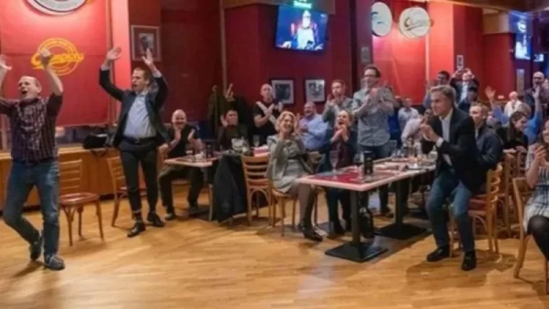 Photos: Blinken Celebrates USA's Football Victory Over Iran